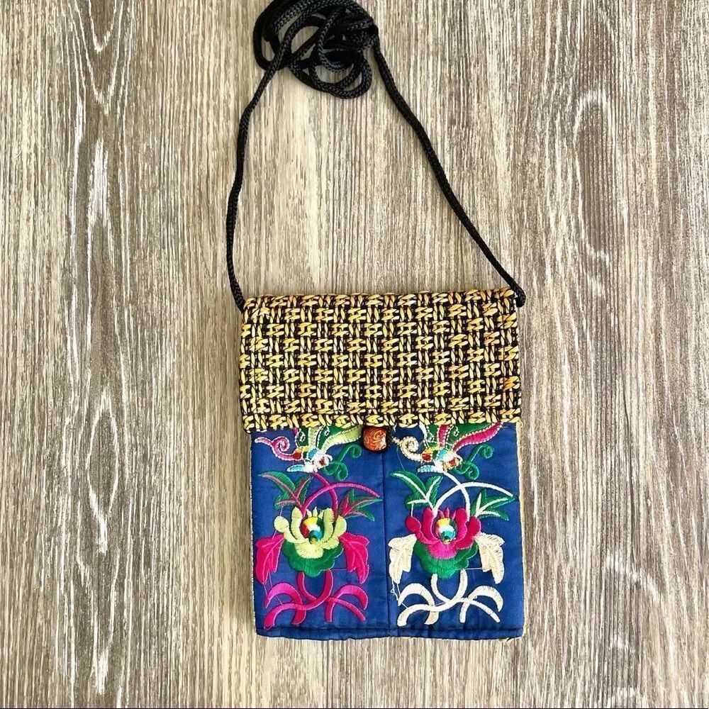 Embroidered cross body bag